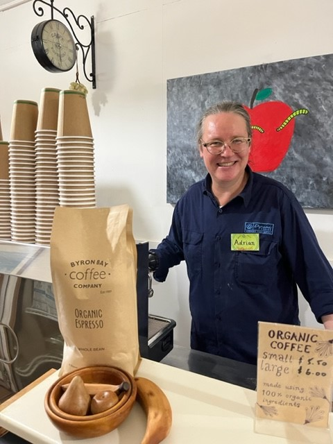 Adrian serving organic coffee